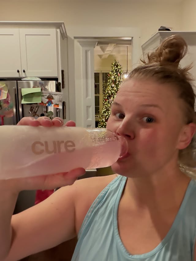Instagram post by @babymommadoc_ for Cure Hydration. Caption reads: [...] you… stay hydrated people! #hydrate....