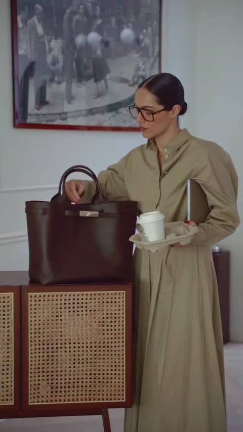 Instagram post by @yevtopyer for Longchamp. Caption reads: [...] My 2026 staple? Le Smart 💼 by @longchamp 🤎....