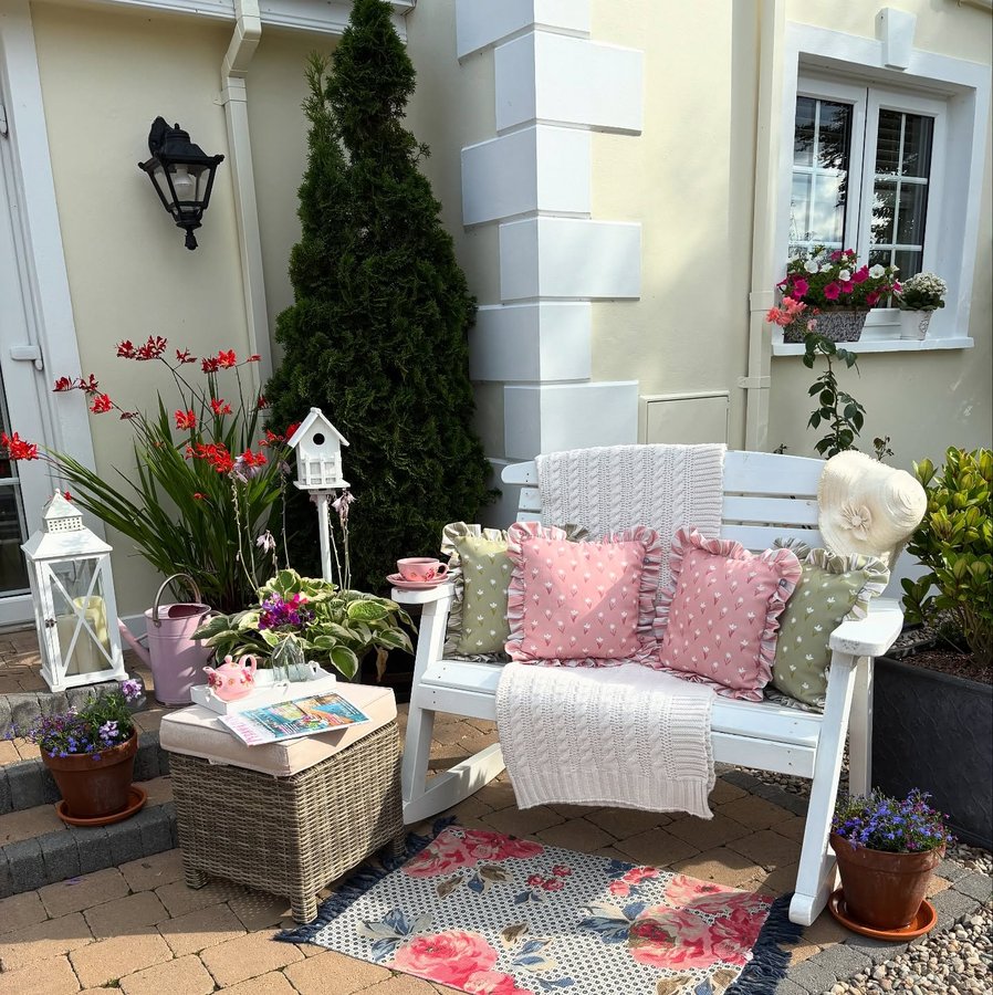 Instagram post by @colleensinteriors for rucomfy beanbags. Caption reads: A quiet cup, a garden chair and a moment to simply....