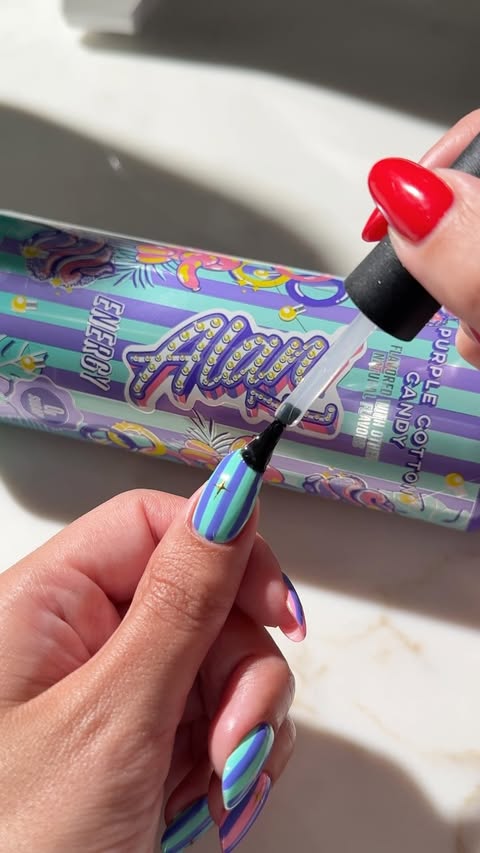 Instagram post by @kuypernailart for Alani Nu. Caption reads: [...] favorite energy drinks 🤤🍇 thank you....