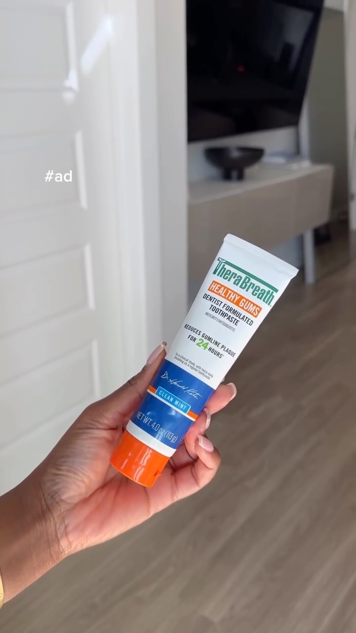 Instagram post by @tajahferjuste for TheraBreath. Caption reads: Healthy gums = healthy smile 🦷✨ I’ve been loving....