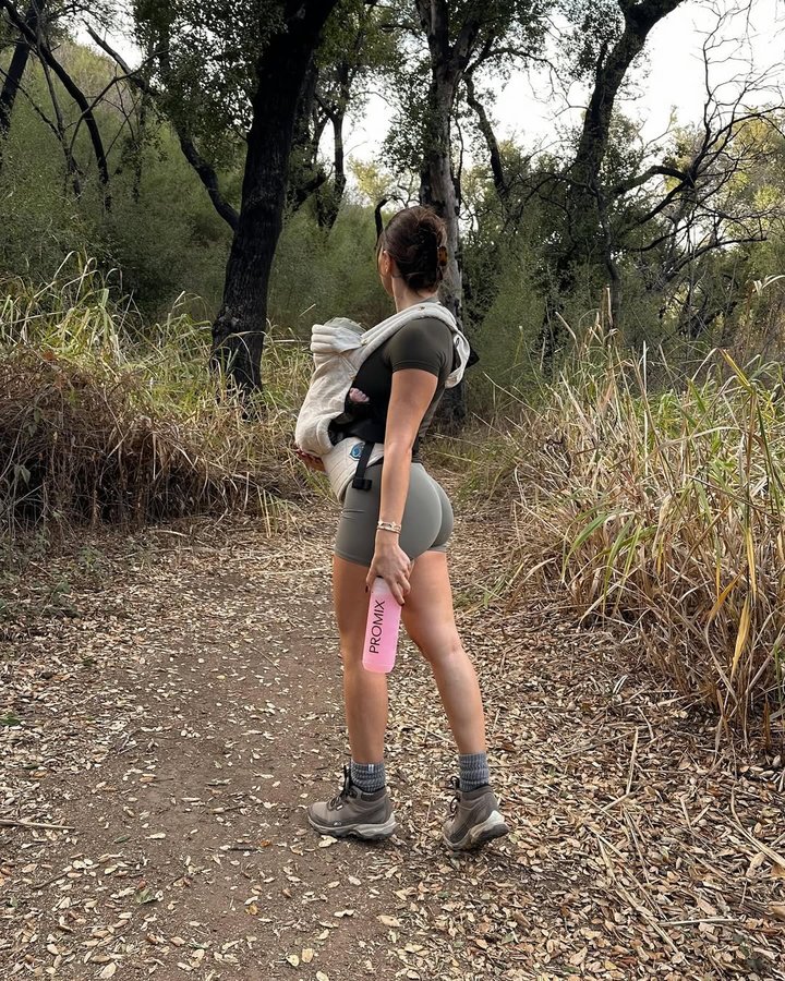 Instagram post by an influencer for Promix Nutrition. Caption reads: Arlos first hike. Found it extra challenge when....