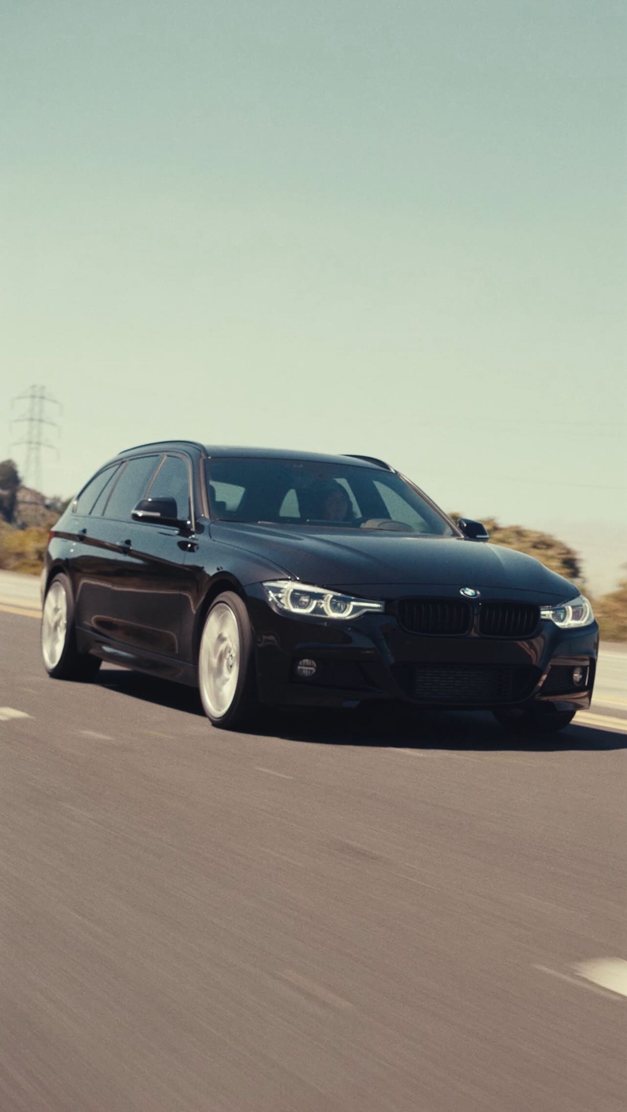 Instagram post by @misscourtneymae for BMW USA. Caption reads: #Sponsored In this house, we drive wagons. It was....