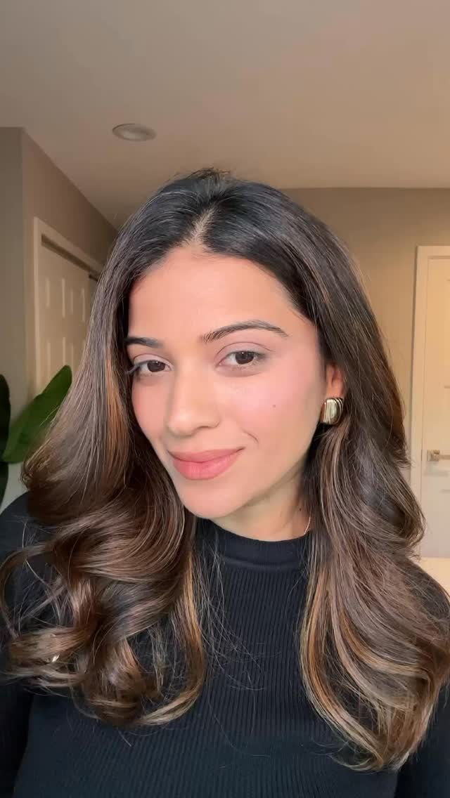 Instagram post by an influencer for Armani beauty. Caption reads: [...] everyday glow, powered by @armanibeauty 🤍....