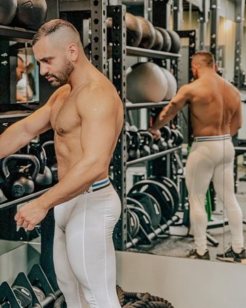 Instagram post by @cenkkmusic for Box Menswear. Caption reads: [...] #glutes #motivation #scruff #boxmenswear....