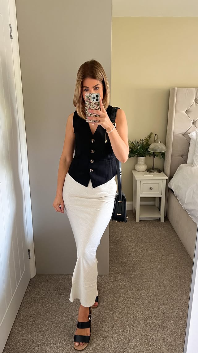 Instagram post by @kirstyannemarr for Dorothy Perkins. Caption reads: [...] wearing my black waist coat from....
