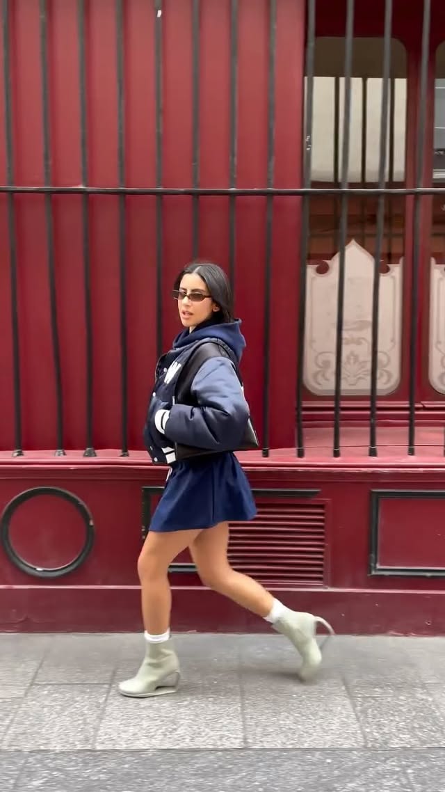 Instagram post by @iaminasse for UNITED NUDE. Caption reads: Walk that walk 👟 10% for your @unitednude shoes....