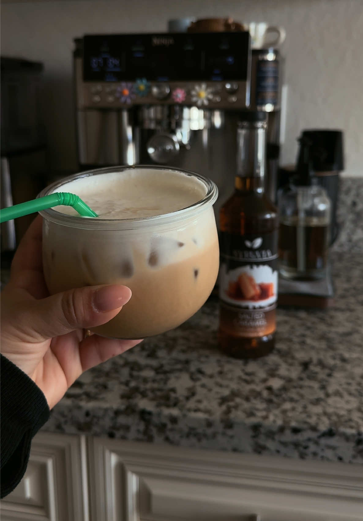 TikTok post by @kaymomm for Syruvia. Caption reads: [...] latte will always taste so good! The....