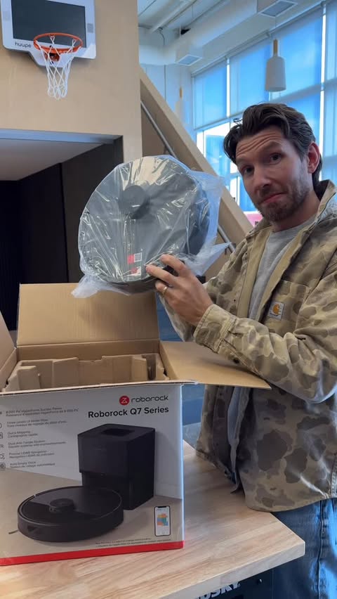 Instagram post by @refreshhomeimprovements for Roborock. Caption reads: [...] Rocky, our newest team member — the....