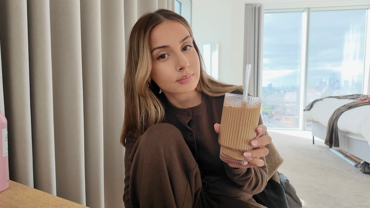 YouTube post by @livvydimartino for Vinted. Caption reads: weekly vlog: juice cleanse, B&M shopping,....