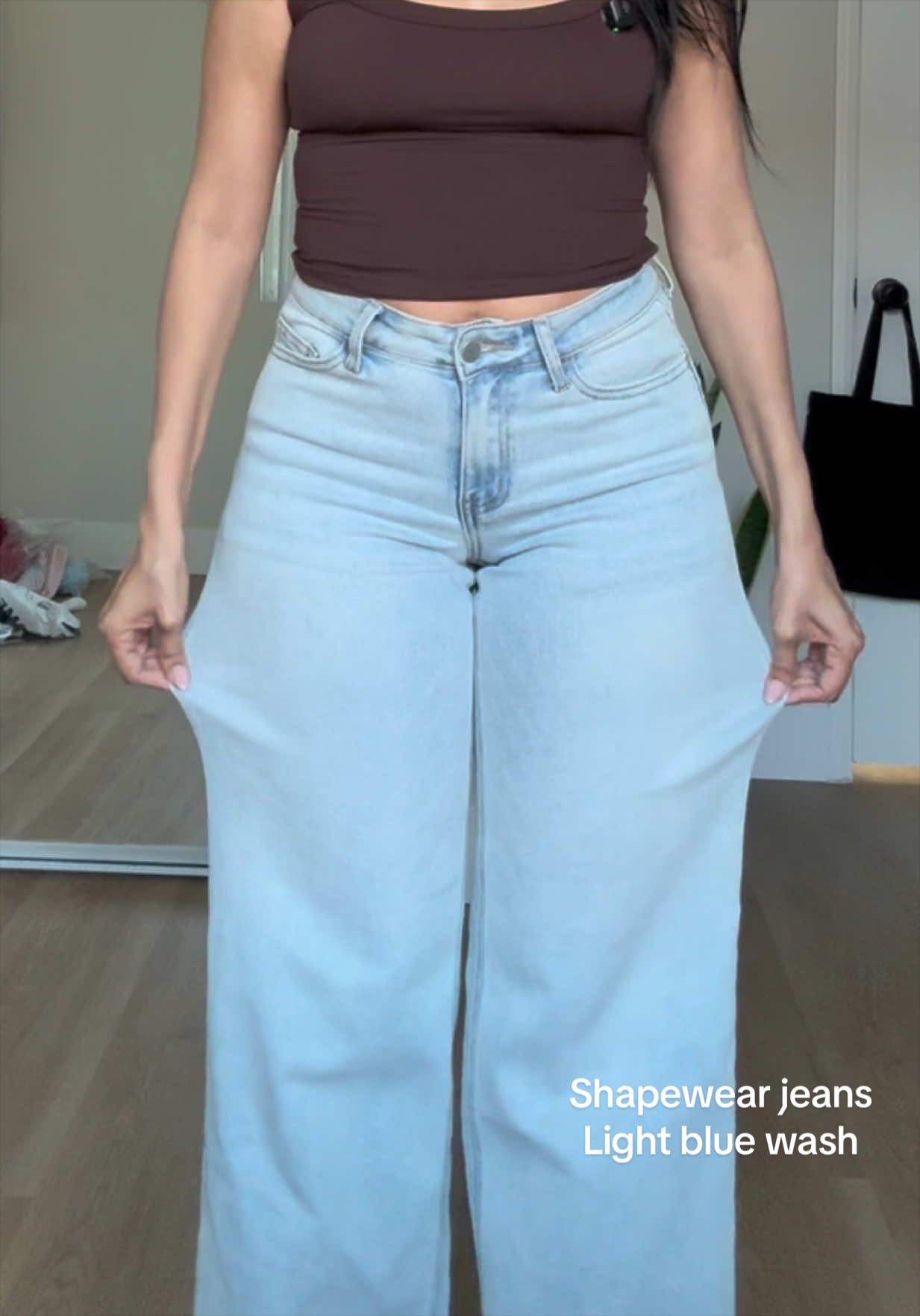 TikTok post by @engieovalle for Vogatiques. Caption reads: Jeans with tummy control and stretch @Vogatiques.