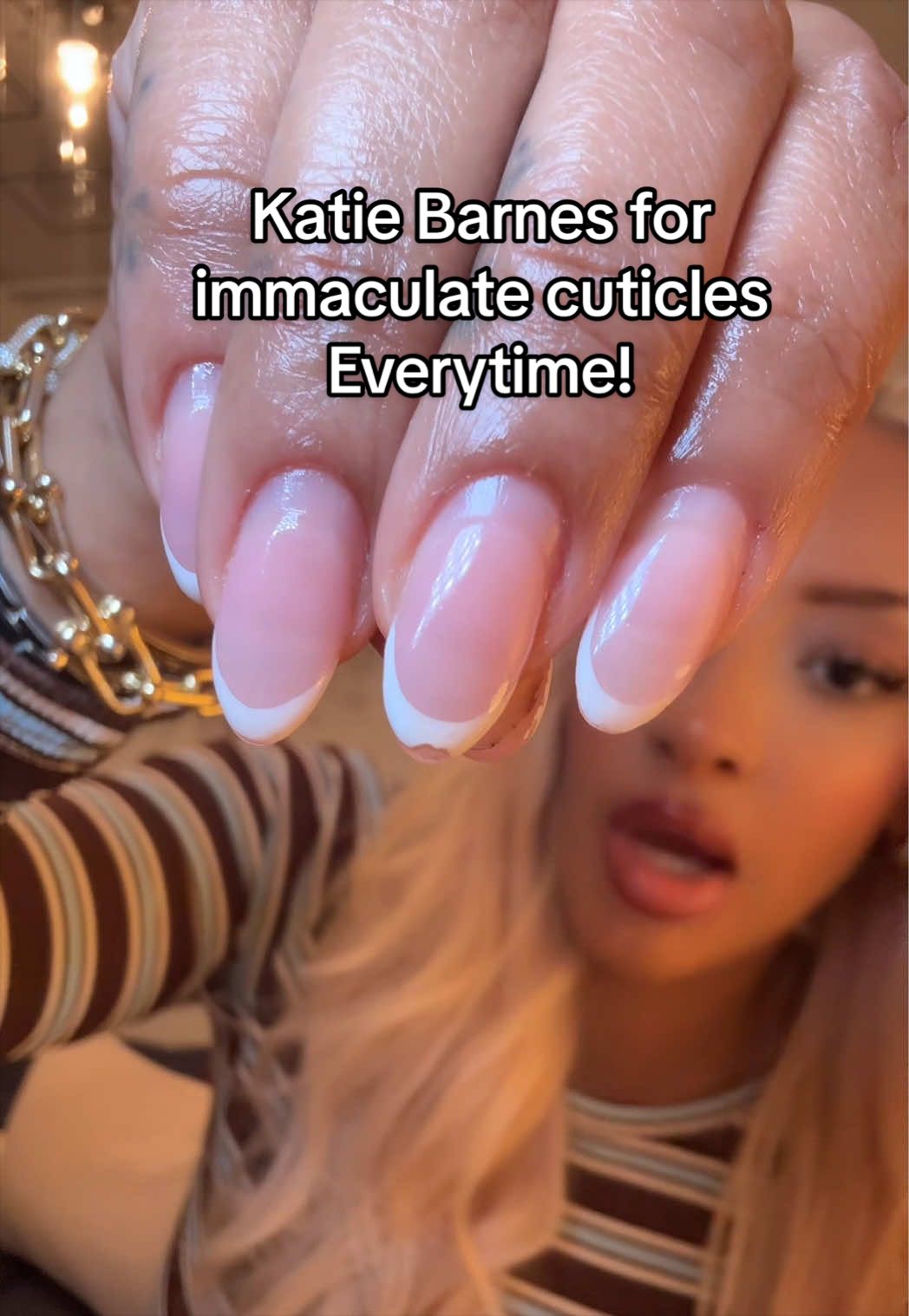 TikTok post by @danispeaks for Katie Barnes Tool Range. Caption reads: The curved @Katie Barnes Tool Range cuticle....