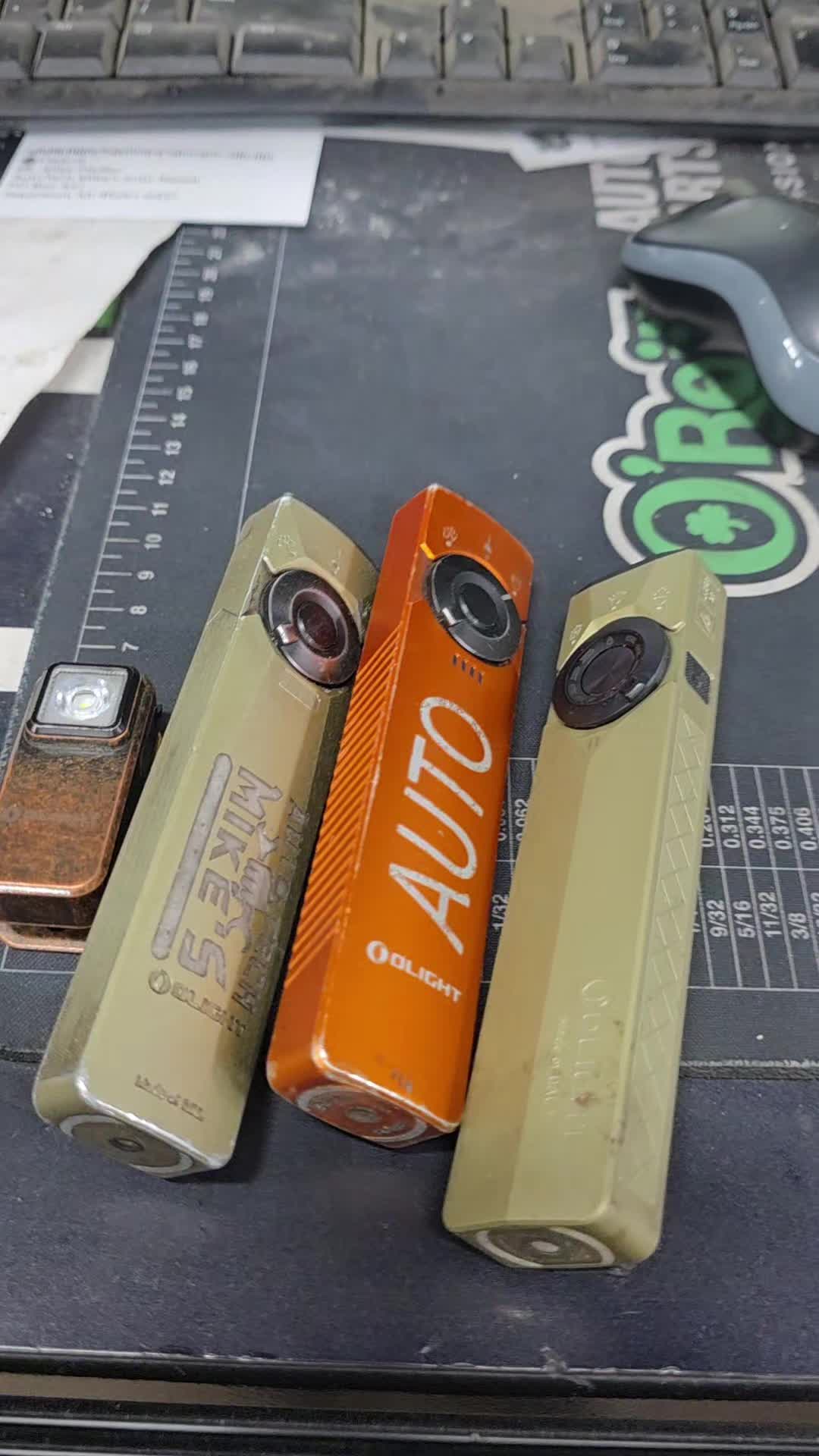 TikTok post by @autotechmike for Olight. Caption reads: [...] #customerstates #wow #automotive @OLIGHT.