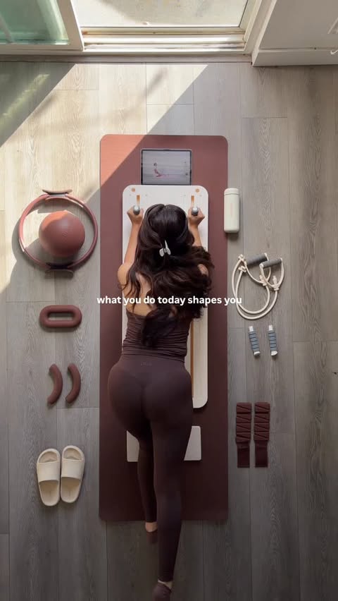 Instagram post by @jenfurbabe for BetterMe. Caption reads: [...] self with the mini pilates board🧘‍♀️✨....
