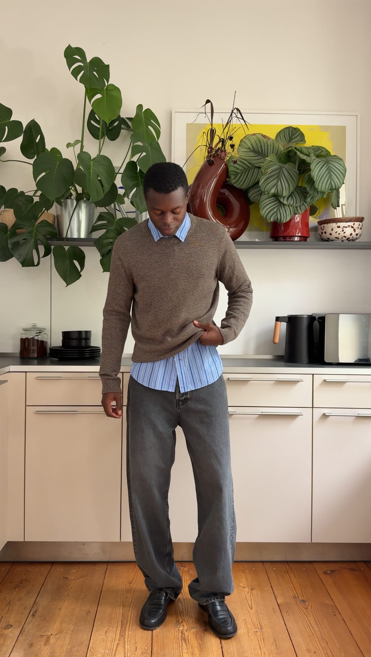 Instagram post by @yaya_tourai for ARMEDANGELS. Caption reads: .
The perfect denim looks different for everyone....