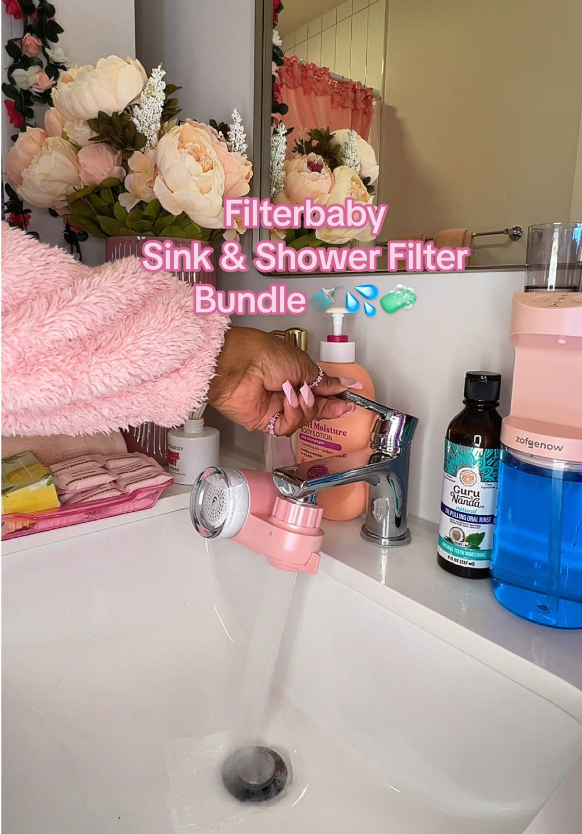 TikTok post by @ceaserbeauty for Filterbaby. Caption reads: [...] get both the sink & shower filter🚿💦....