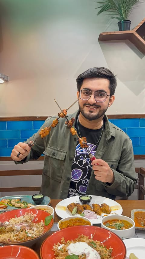 Instagram post by @thefoodieshub for Barbeque Nation. Caption reads: Experience the Royal Lucknowi Dastarkhwan by Chef....