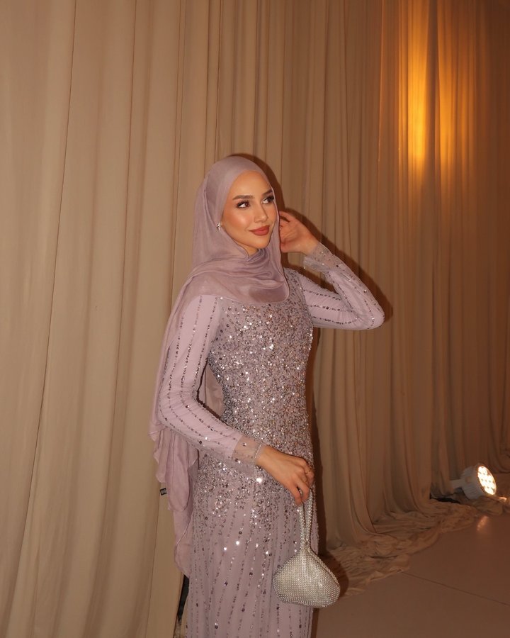 Instagram post by @ervaarslan_ for Mac Duggal. Caption reads: [...] purple fairy in this dress 🧚🏼‍♂️....