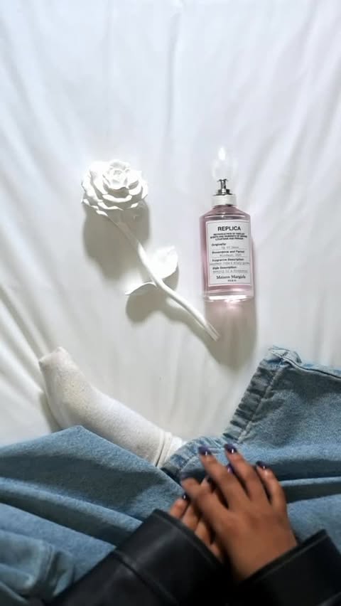 Instagram post by @minnieeeeee_ for Maison Margiela Fragrances. Caption reads: [...] again. #SmellsLikeMemories....