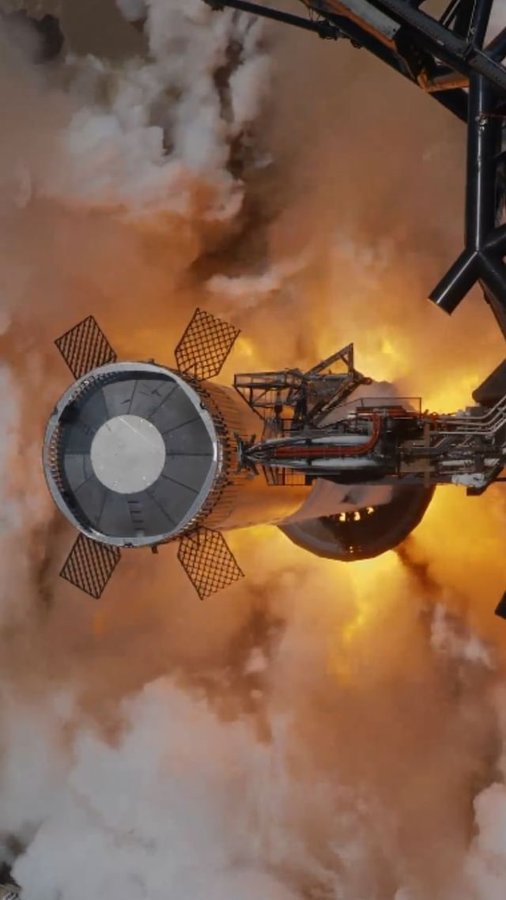 Instagram post by @newspaceenterprise for SpaceX. Caption reads: Starship Booster test fire.

📷:....