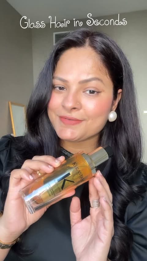 Instagram post by @kirti.jaisani.bohra for Kérastase. Caption reads: Glass Hair in Seconds @kerastase_official Elixir....