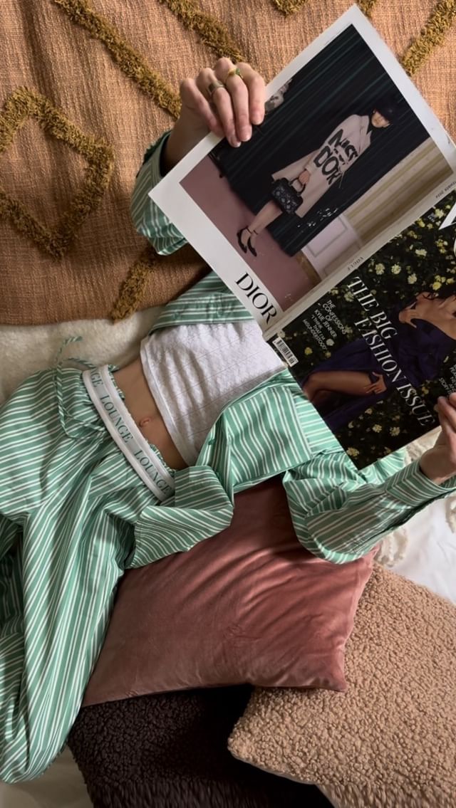 Instagram post by an influencer for Lounge. Caption reads: slow, cosy Sunday moments with @lounge_ AD ✨🥐☁️....