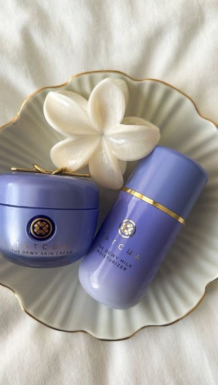 Instagram post by @estellelebourgeois_ for Tatcha. Caption reads: skin is about to be GLOWING ⭐️💜🫧 @tatcha....