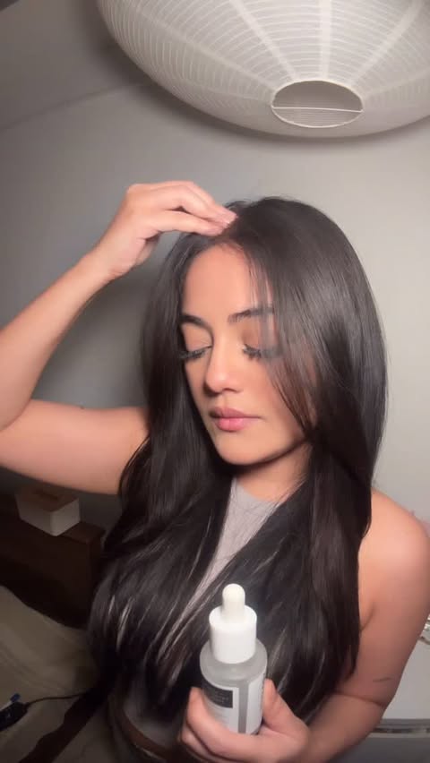 Instagram post by @okaysina for Novology. Caption reads: We may look fine… but let’s be honest, hairfall is....