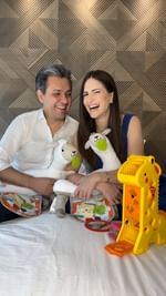 Instagram post by @majumendonca for Fisher-Price. Caption reads: Aprender brincando! Aqui em casa, sempre que vamos....