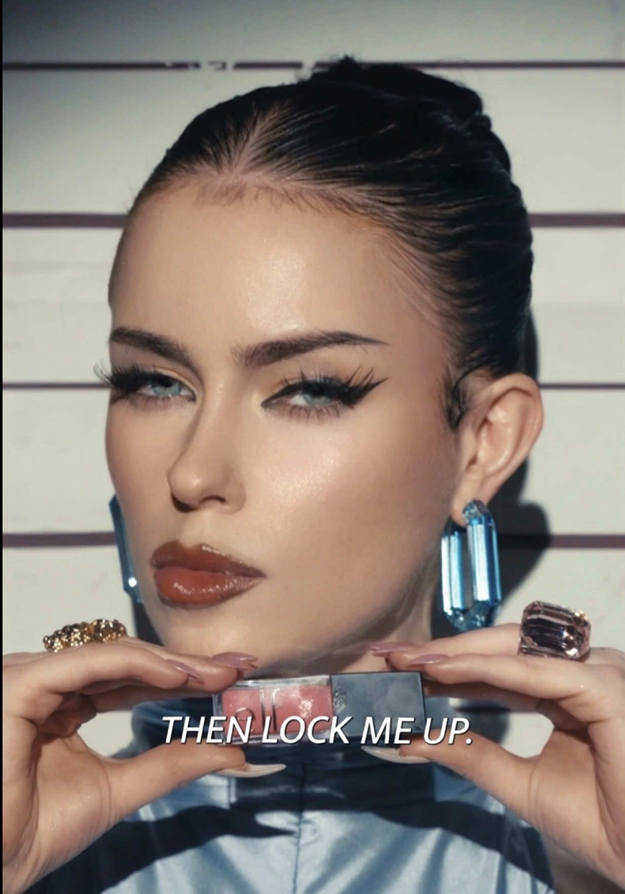 TikTok post by an influencer for e.l.f. Cosmetics and Skincare. Caption reads: Guilty of serving eyes, lips and face @e.l.f.....