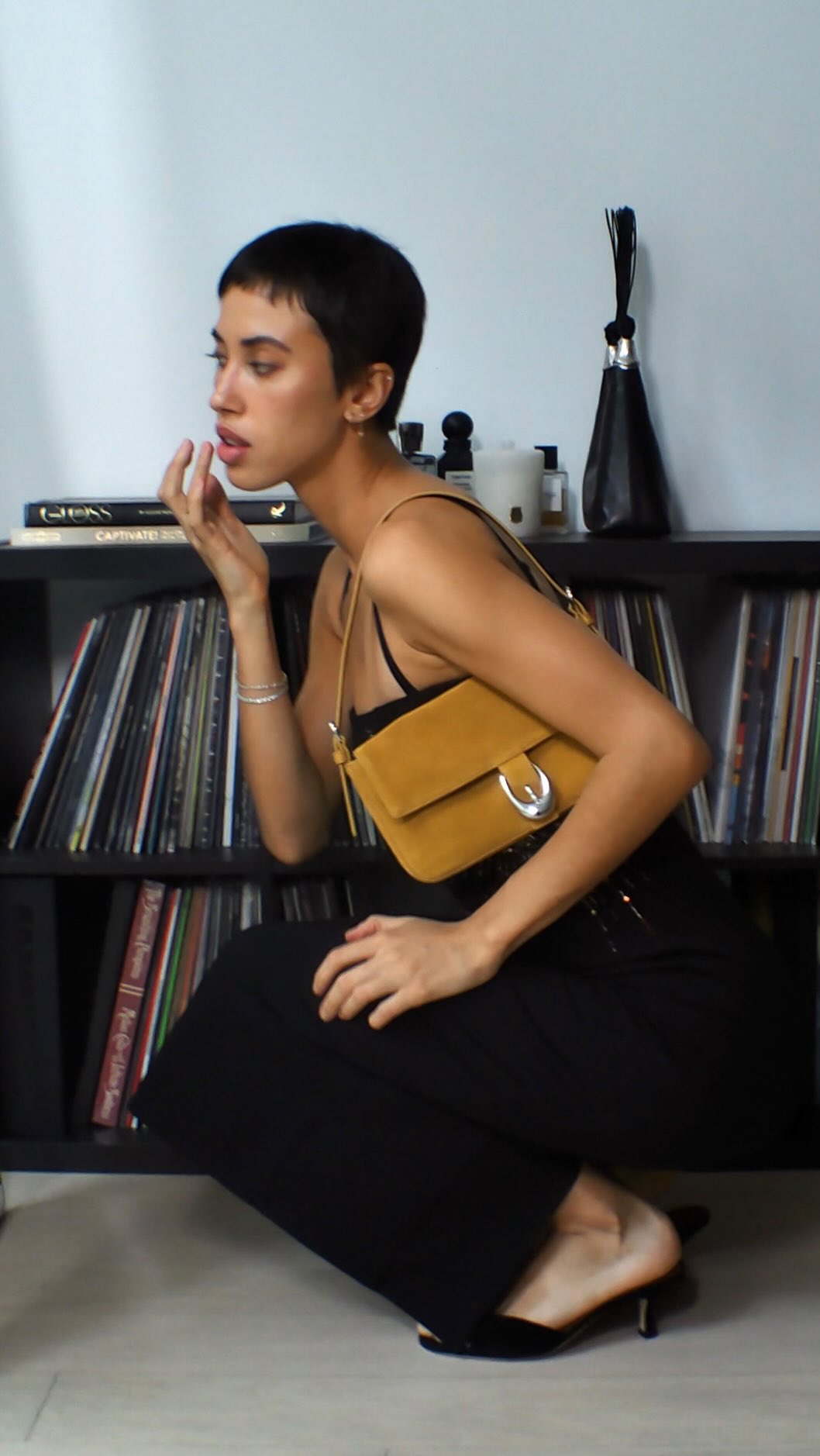 Instagram post by @polina.isadora for STAUD. Caption reads: Seasons changing means one thing… @staud.clothing....