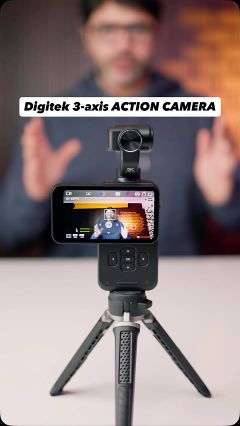 Instagram post by @the.photography.blogger for Digitek. Caption reads: Digitek 3-axis Handheld Action Camera with AI Face....