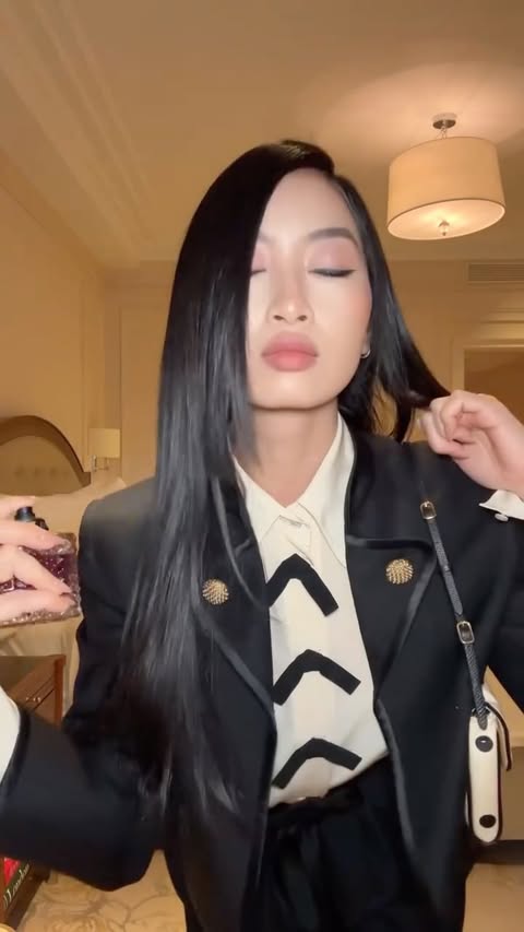 Instagram post by @thanya for Valentino. Caption reads: Party ready with @valentino.beauty....