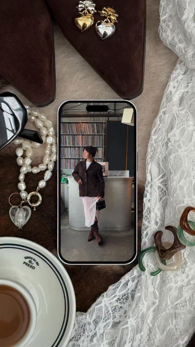 Instagram post by @rae.hersey for Marc Fisher. Caption reads: me + knee high boots = 🤎
styling my @marc.fisher....