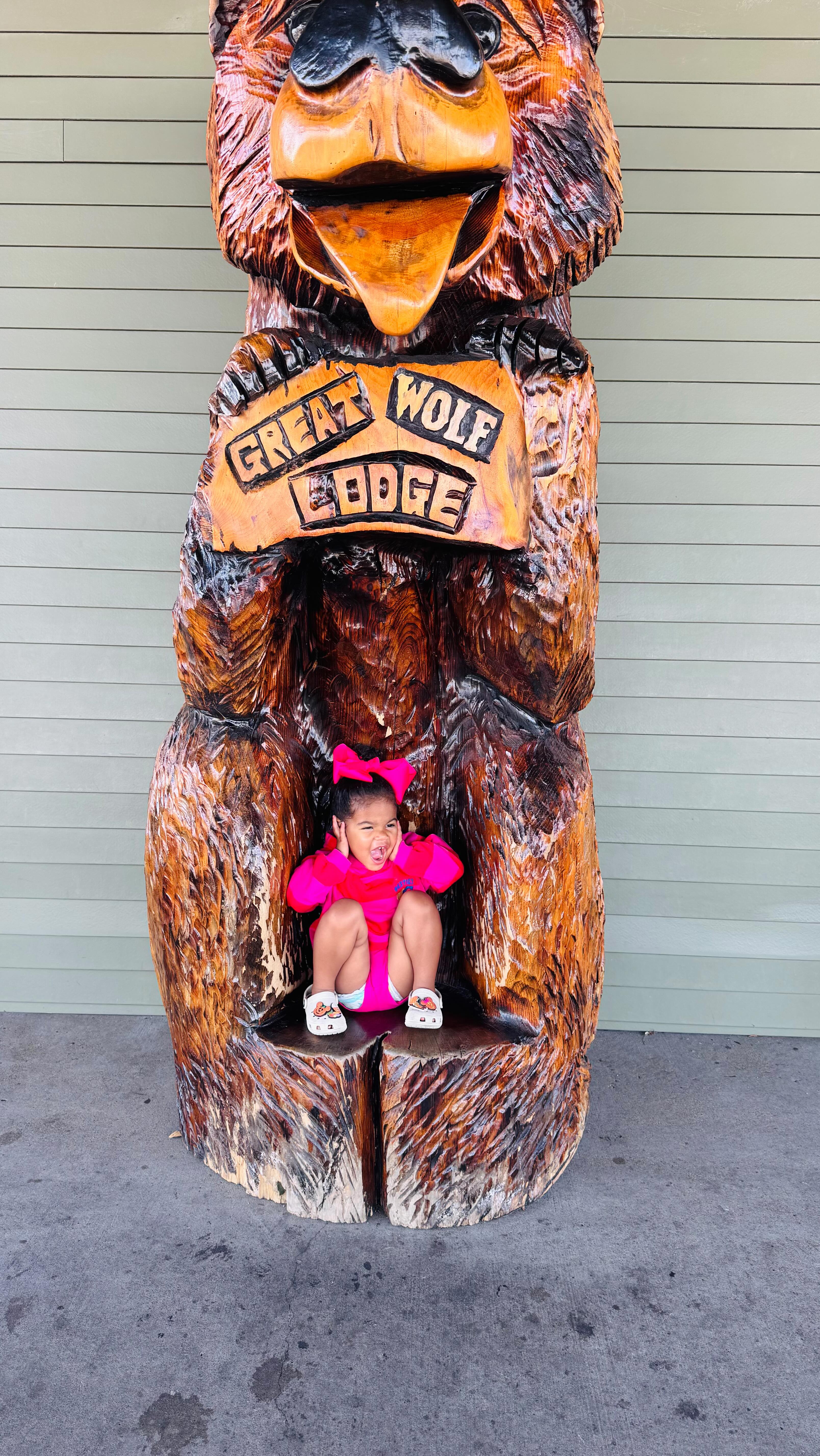 Instagram post by @itsmoniquesworld for Great Wolf Lodge. Caption reads: 🐺🎃🫶🏽
This weekend we got to surprise Lulu with....