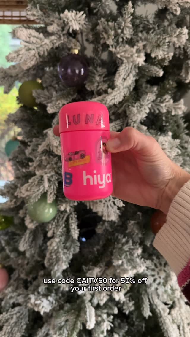 Instagram post by @cait.vogel for Hiya. Caption reads: Holiday chaos? Still taking our vitamins ✨....