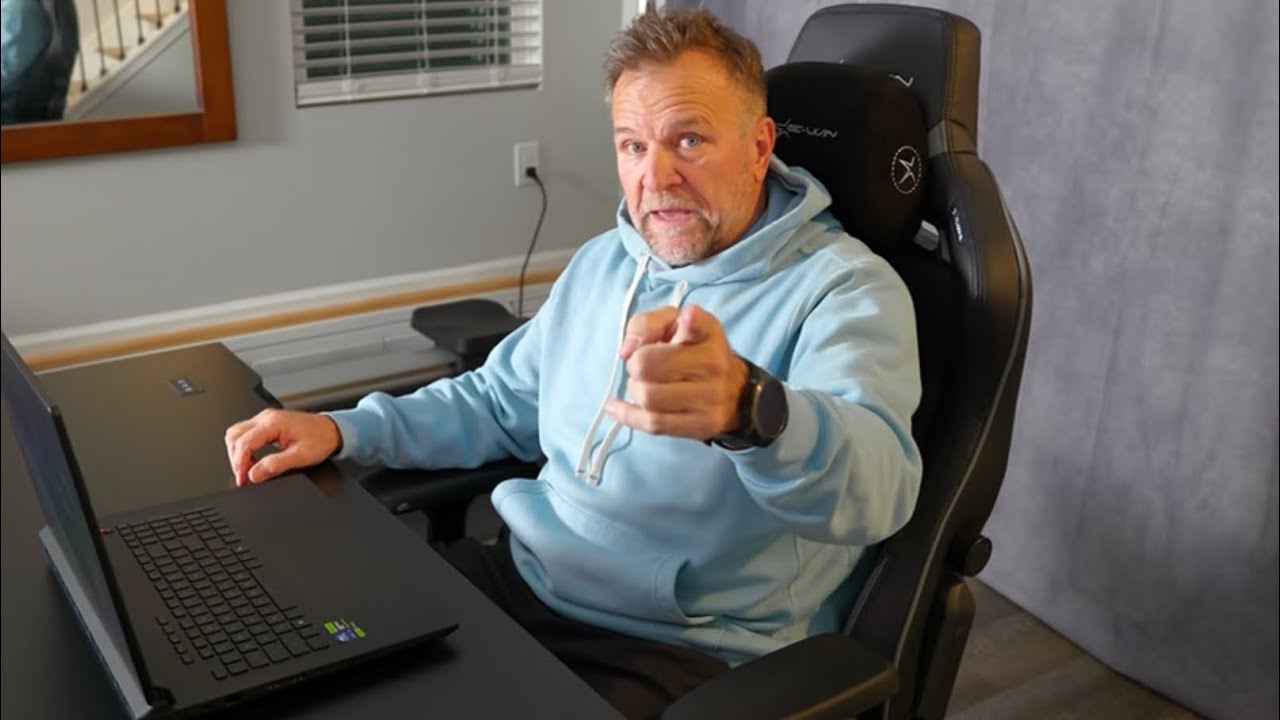 YouTube post by @ned_luke for EwinRacing. Caption reads: Ewin Racing sent me a desk that’s 🔥🔥.