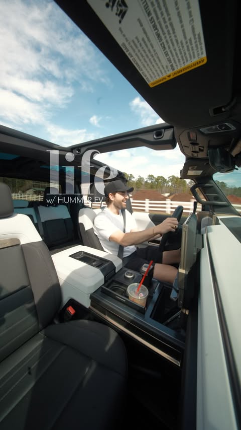 Instagram post by @thespenceryan for GMC. Caption reads: Daily driving the #GMCHUMMEREV is a blast ☀️ @GMC....