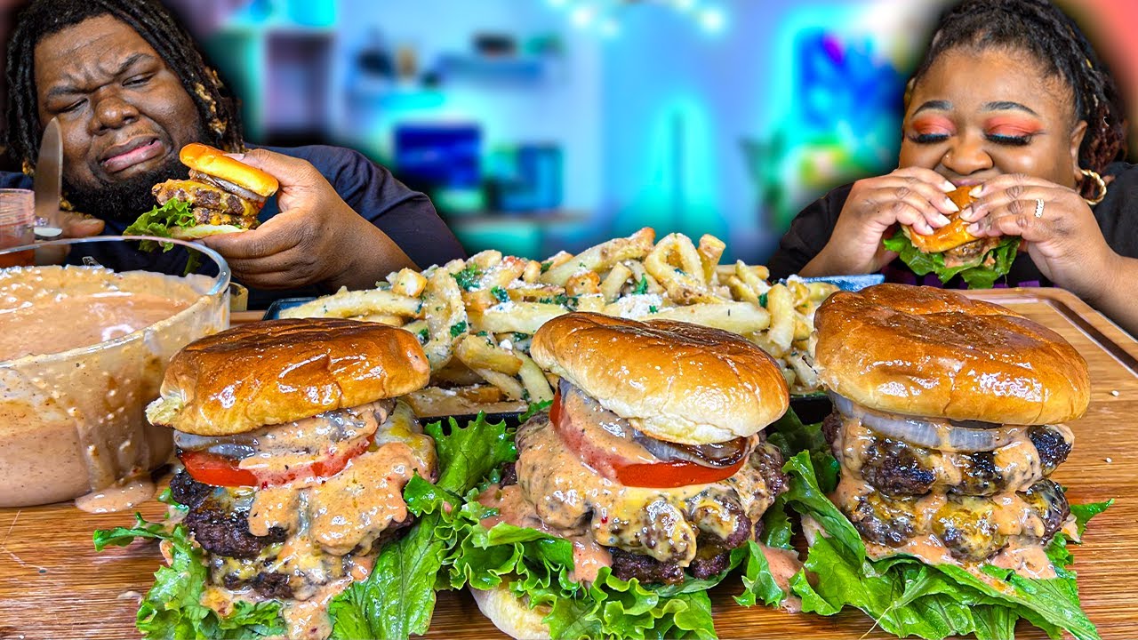 YouTube post by @hashtagthecannons for Coldest. Caption reads: GIANT JUICY DOUBLE CHEESEBURGERS MADE AT HOME |....