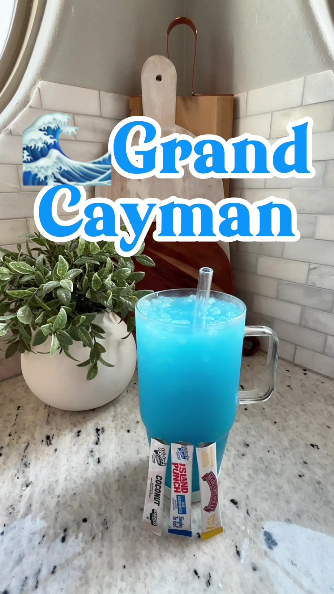 TikTok post by @jennlynn1124 for Singles To Go. Caption reads: 🌊Grand Cayman water💦 @Singles To Go @WylersLight....