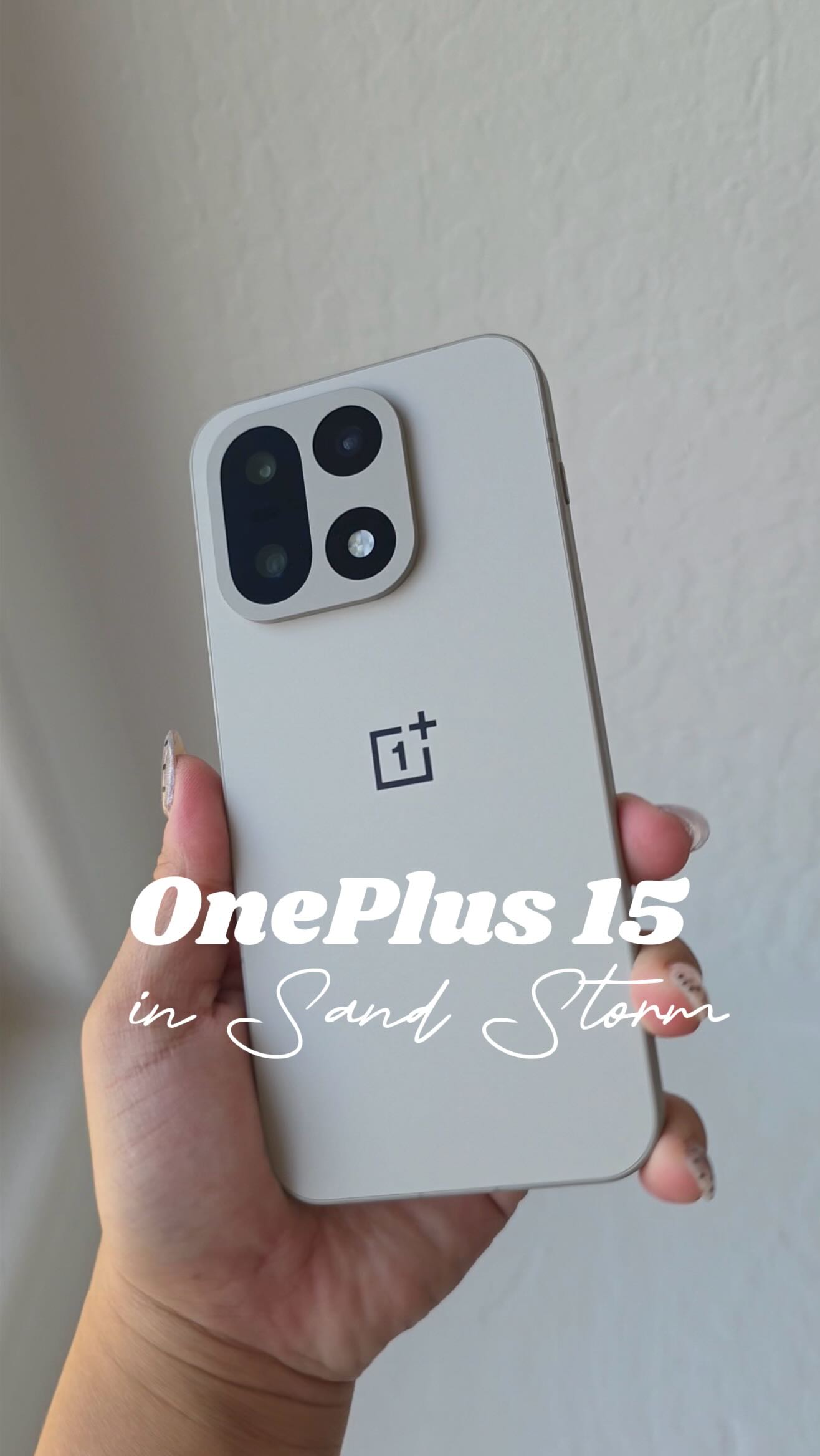 Instagram post by @jennybdoll for OnePlus. Caption reads: OnePlus 15 in SandStorm is aesthetic girlie’s....