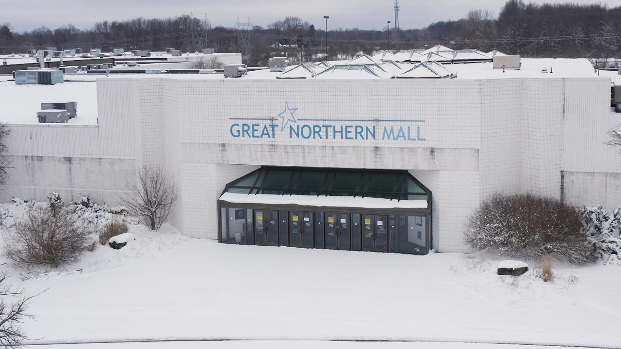 YouTube post by @TheProperPeople for LANDR. Caption reads: Exploring the Abandoned Great Northern Mall -....