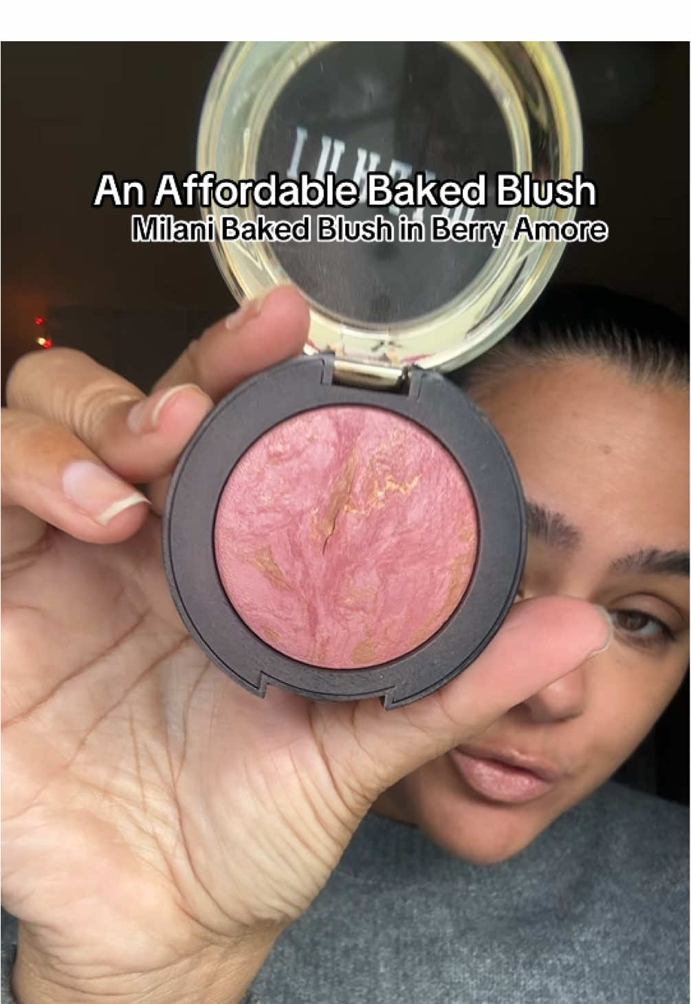 TikTok post by @thenotarichgirl for Milani Cosmetics. Caption reads: Affordable Baked Blush. @Milani Cosmetics....