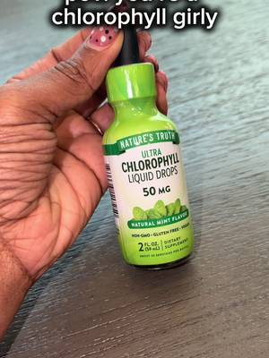 TikTok post by @thems.d for Nature's Truth. Caption reads: [...] my daily line up🥰🍃💚 #chlorophyll....