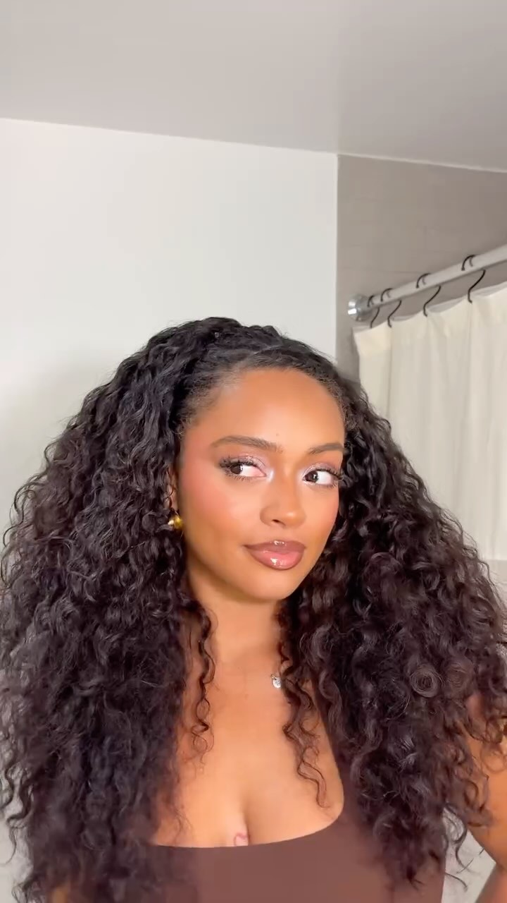 Instagram post by @jasmyndestine for Ouidad. Caption reads: #AD Summer is the time for cute updo’s and styling....