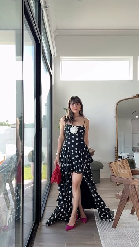 Instagram post by @spanglishfashion for REVOLVE. Caption reads: [...] screaming Feria vibes 🇪🇸 / Dress via....