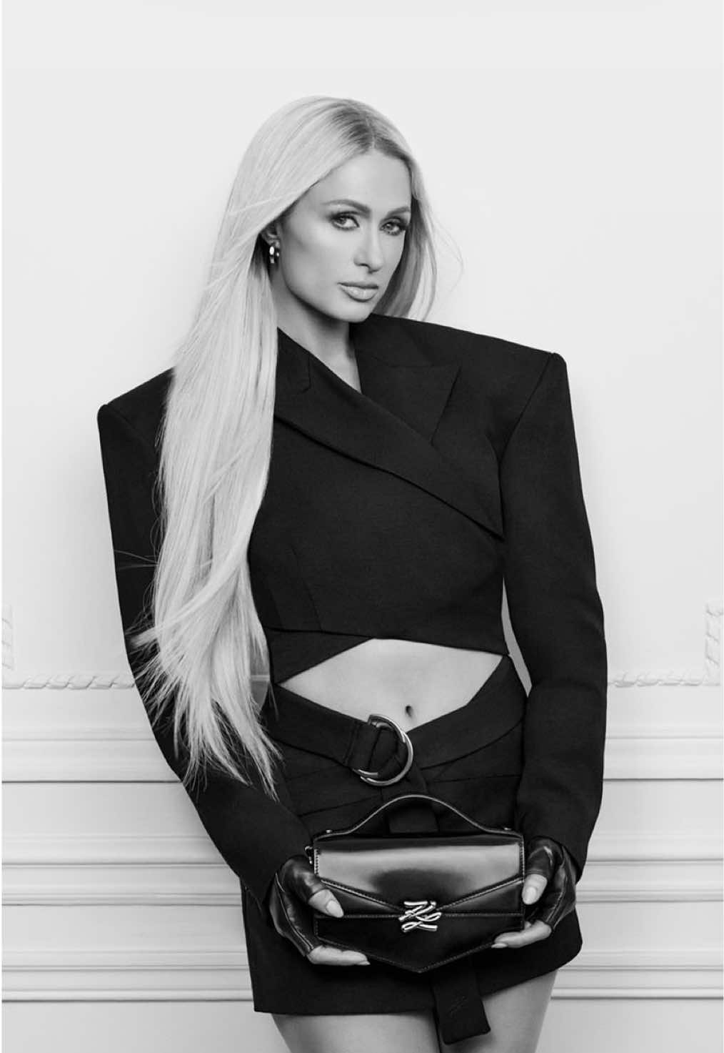 TikTok post by @parishilton for KARL LAGERFELD. Caption reads: [...] Paris Hilton presents the @Karl Lagerfeld....