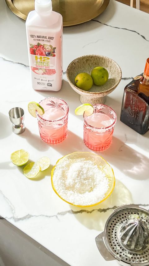 Instagram post by @melbournefoodnerd for H2coco. Caption reads: [...] drink, a margarita, with a splash of @h2coco....