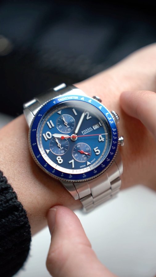 Instagram post by an influencer for Fossil. Caption reads: The Fossil Tourer - fits ANY occasion The [...].