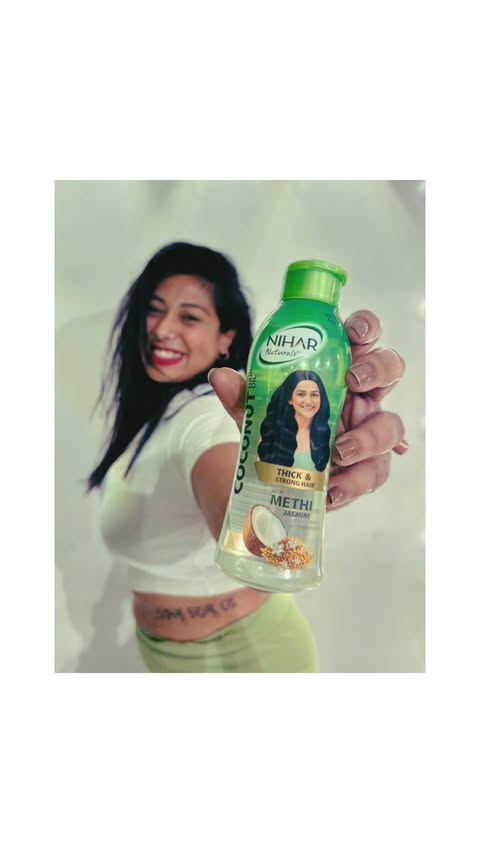 Instagram post by @jhilik_paul for Nihar Naturals. Caption reads: Have you heard this song ? 🌸💚 . #ad #collab....